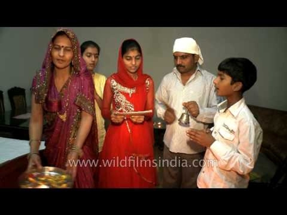 Aarti performed by a Hindu family on Diwali