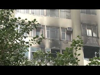 Burnt black patches on the Himalaya house after the fire