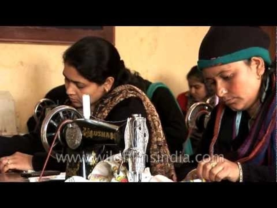 Indian women sewing with traditional machines
