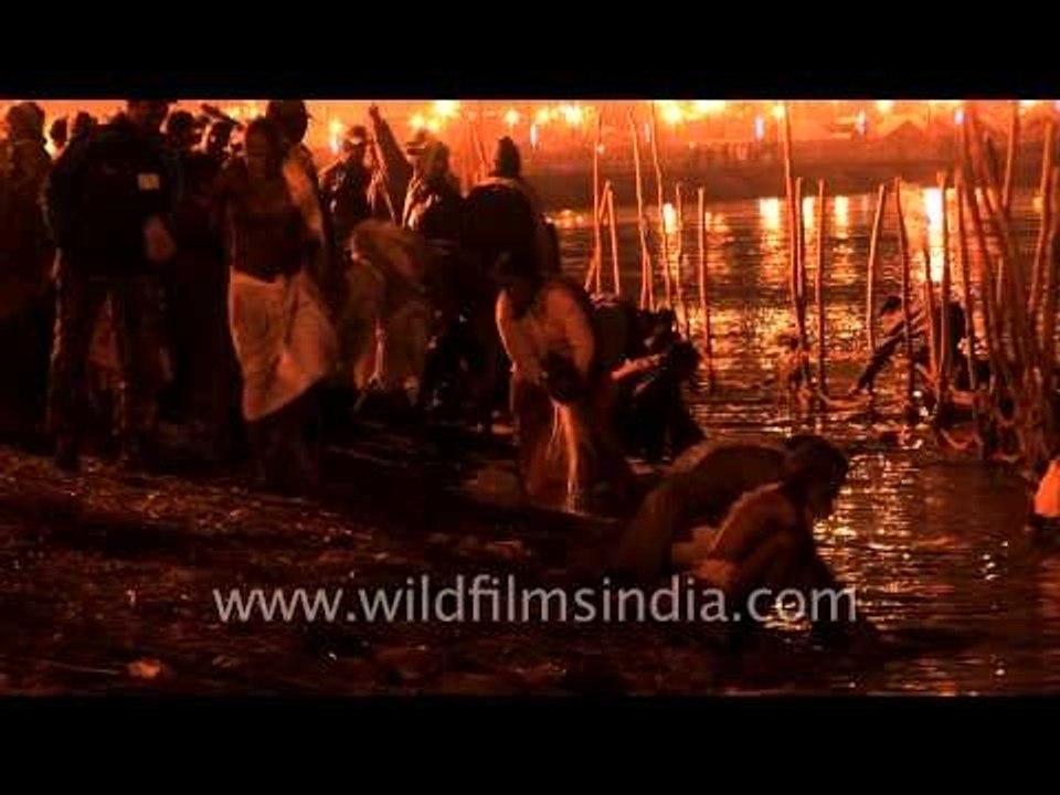 Pilgrims washing away their sins in Ganga river during Kumbh!