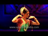 International dancer performing Odissi dance form