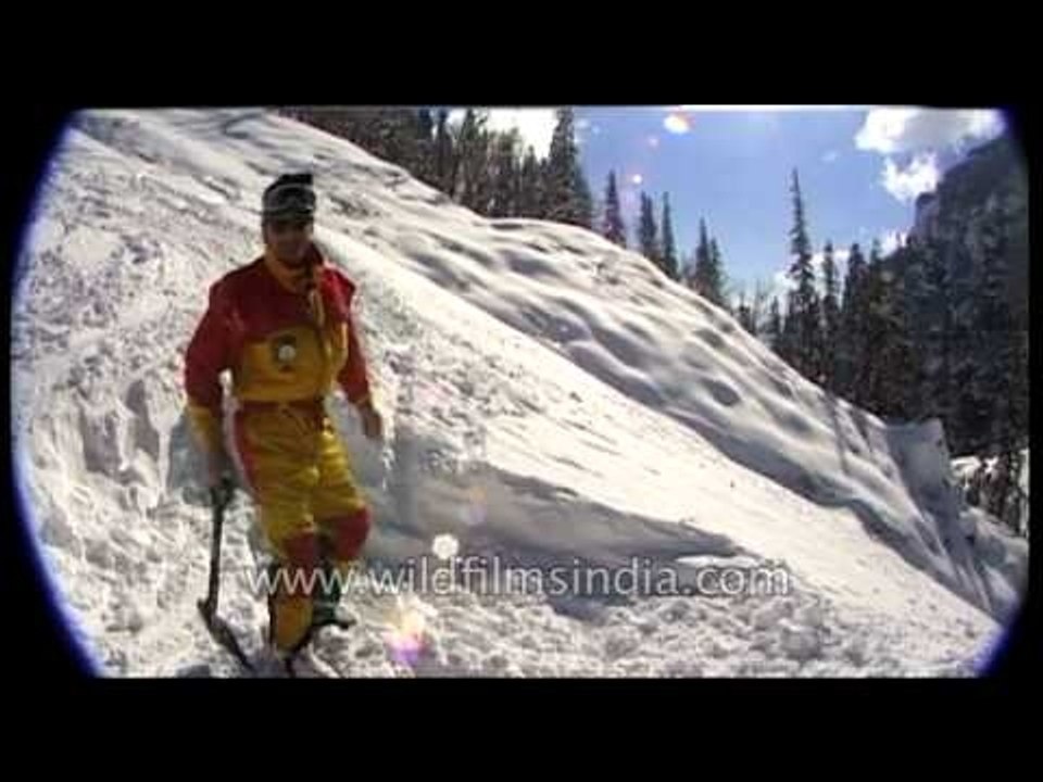Skier shovelling at a Himalayan ski resort