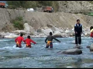 Students undertake a Himalayan river crossing