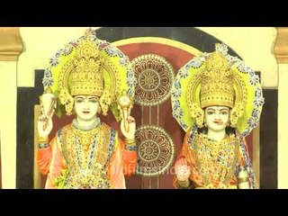 Devotees standing in a long queue for the darshan of Lord Krishna