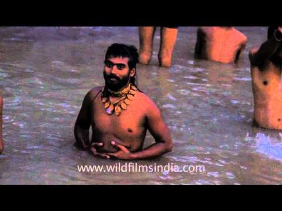 Dipping in the holy waters of Yamuna river on Janmahthami, Vrindavan