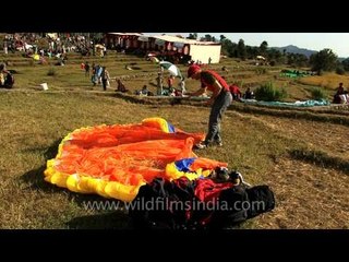 Pilots fold paragliders in Billing