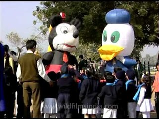 Mickey Mouse & Donald Duck visiting kids at the kite festival, Delhi