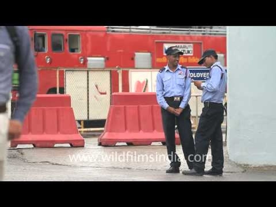 Group 4 G4S Security guards posing in front of camera outside Maruti suzuki's plant