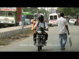 Motorcycle rider on the streets of Delhi