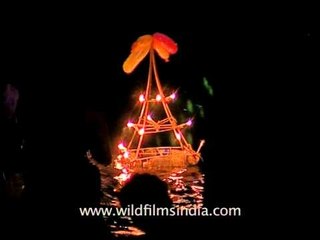 Pilgrims offering big lighted lamps to Pampa river in Sabarimala