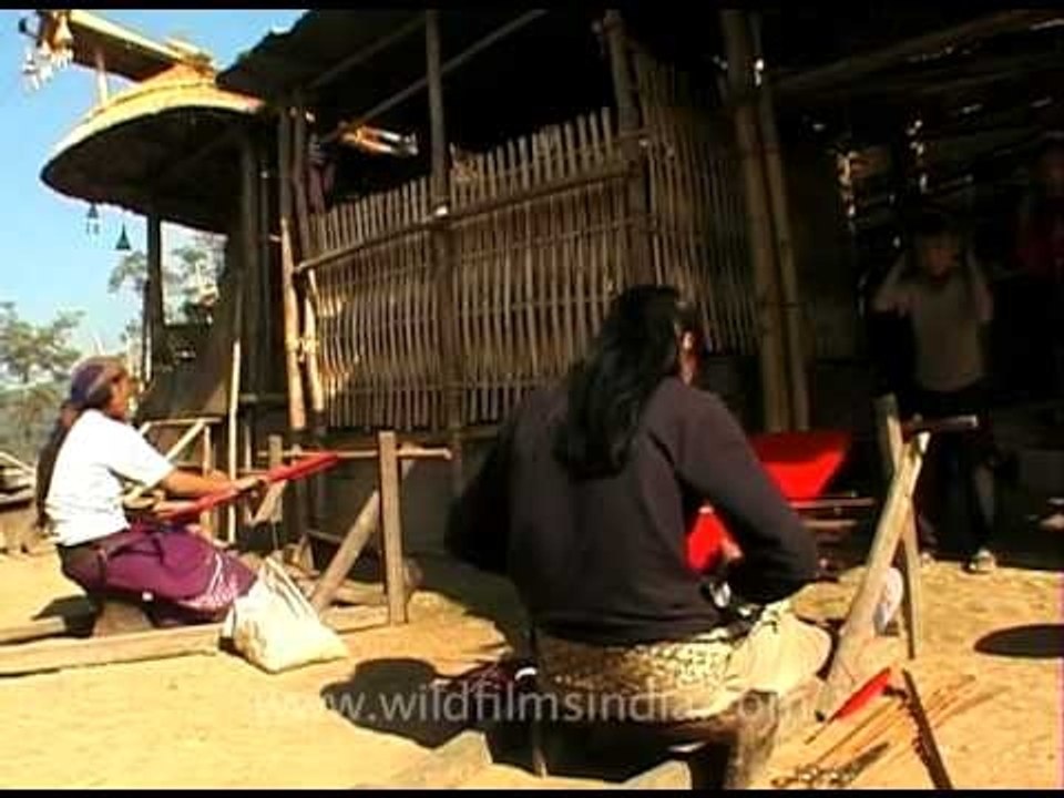 Lotha women weaving on back strap looms, Longsa...
