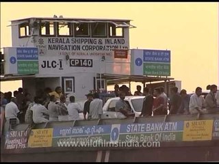 Ferry boats carrying people and vehicles in Cochin