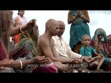 Hindu rites being performed in India, along the sea-coast!