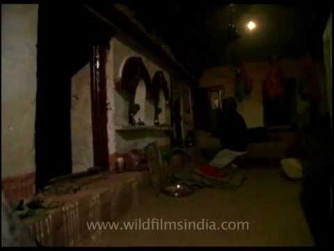 Devotees praying at a temple in Lakhat