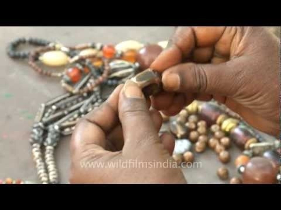 Stringing beads onto a thread!