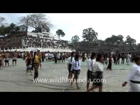 Mizos in full traditional dress taking part at Chapchar Kut sports