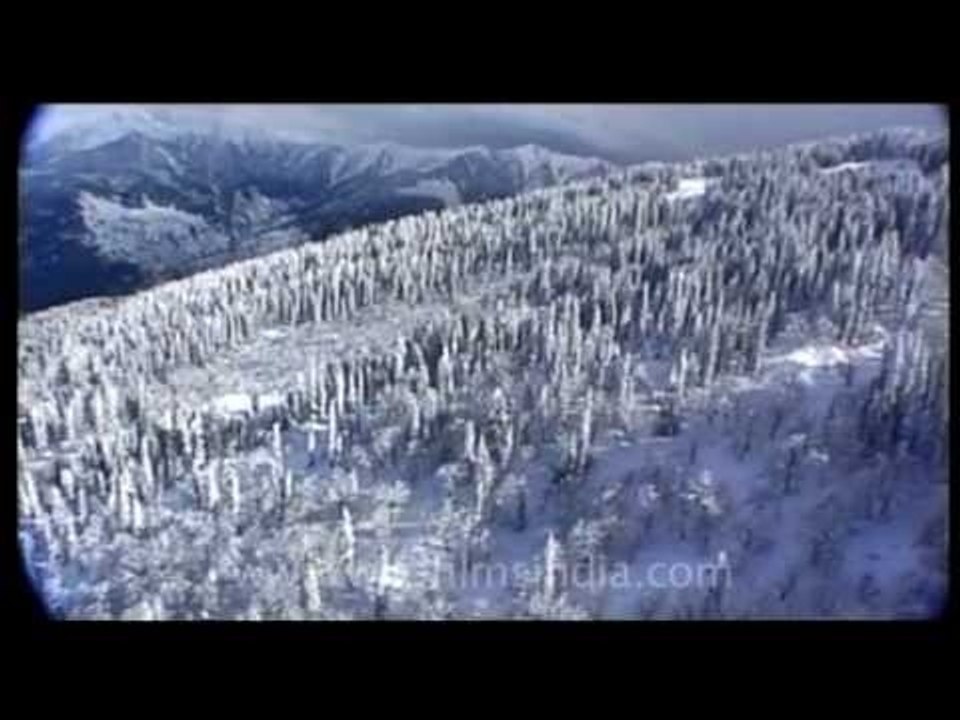 Instructors talk about avalanche risk while skiing in Himalayas