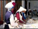 Tihar prisoners kneading Roti dough