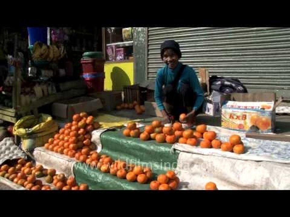 Woman selling oranges in Aizawl, Mizoram