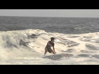 Surfers having a good time, Indonesia