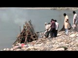 Burning human corpses at Chandi Ghat, Haridwar