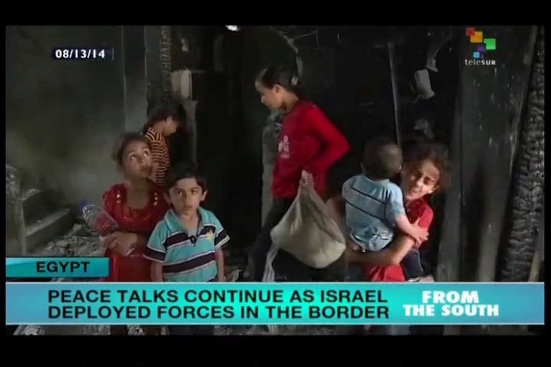 Gaza peace talks continue while Israel deploys troops on the border