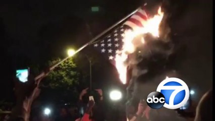 Burning American flag by americans