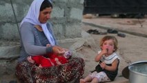 Yazidi refugee: Islamic State took women 