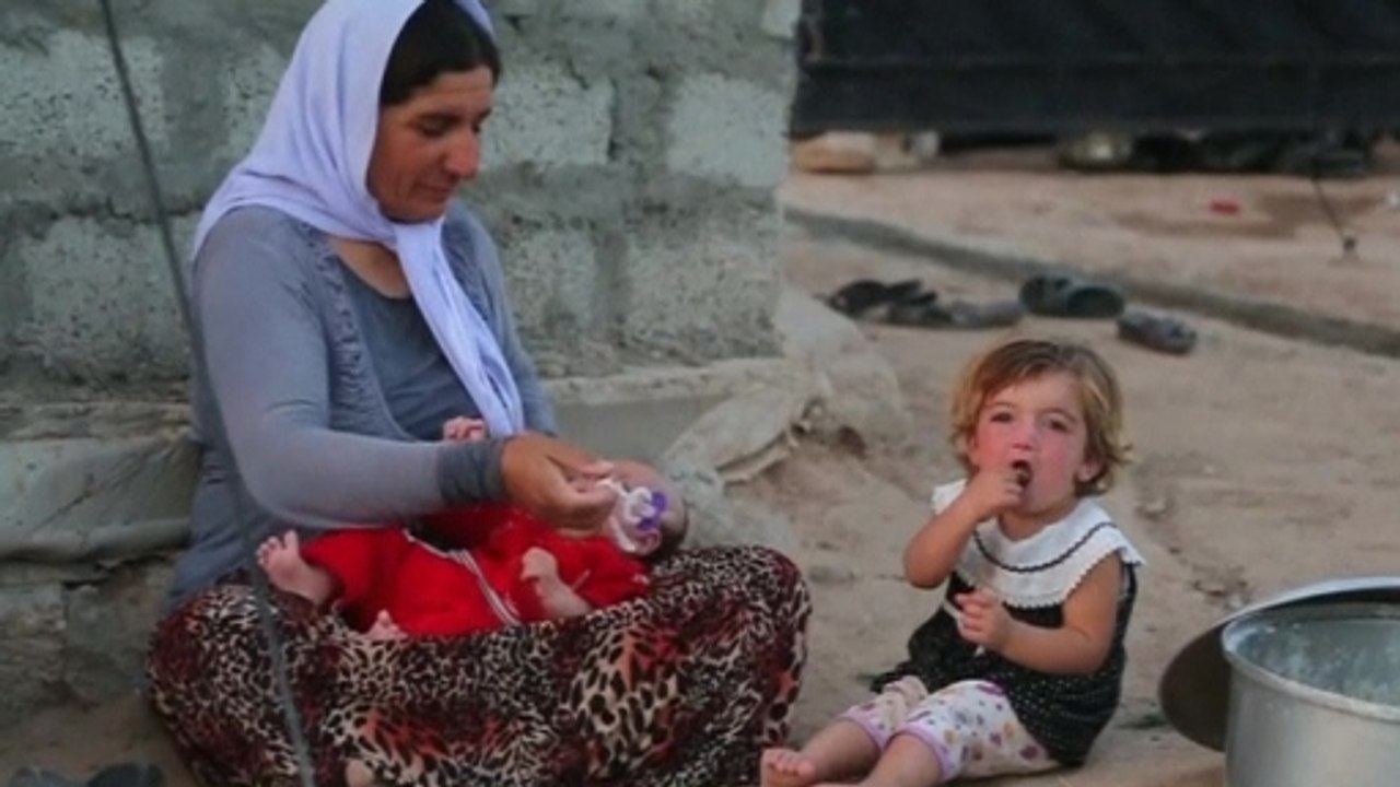 Yazidi refugee: Islamic State took women "for themselves"