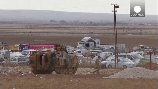 Calls for a 'humanitarian corridor' between Turkey and besieged Kobani