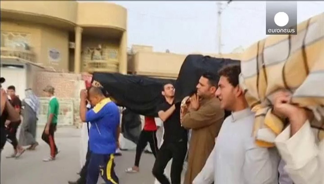 تفجيرات انتحارية تقتل العشرات في ديالى و تشيع للضحايا بغداد