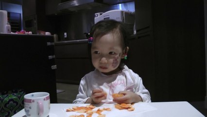 Girl Eating Oranges