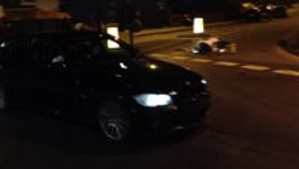 Biker crashes in to a BMW