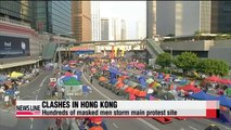 Hong Kong's protesters put up new barricades as police dismantle them