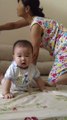 Baby boy learns how to crawl