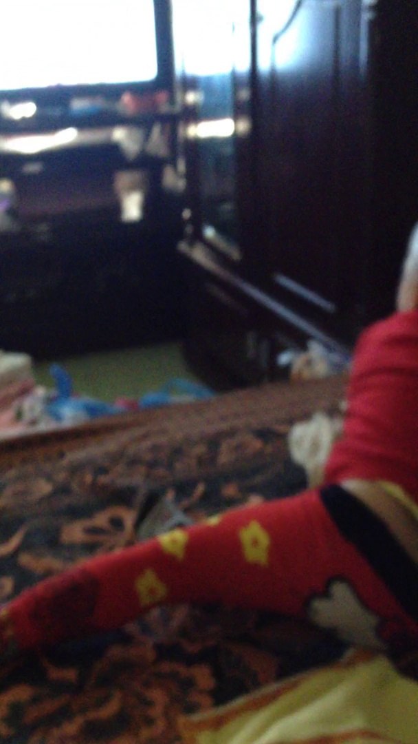 Baby jogging around watching cartoon movies