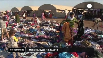 Скачать видео: Exhausted Yazidis fleeing militants reach refugee camp in Syria