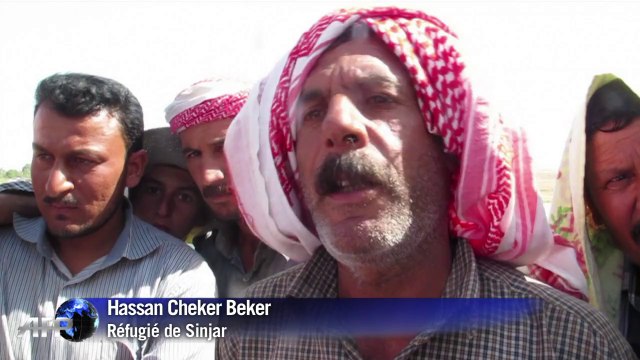 Des réfugiés Yazidis arrivent en Irak après des jours de marche