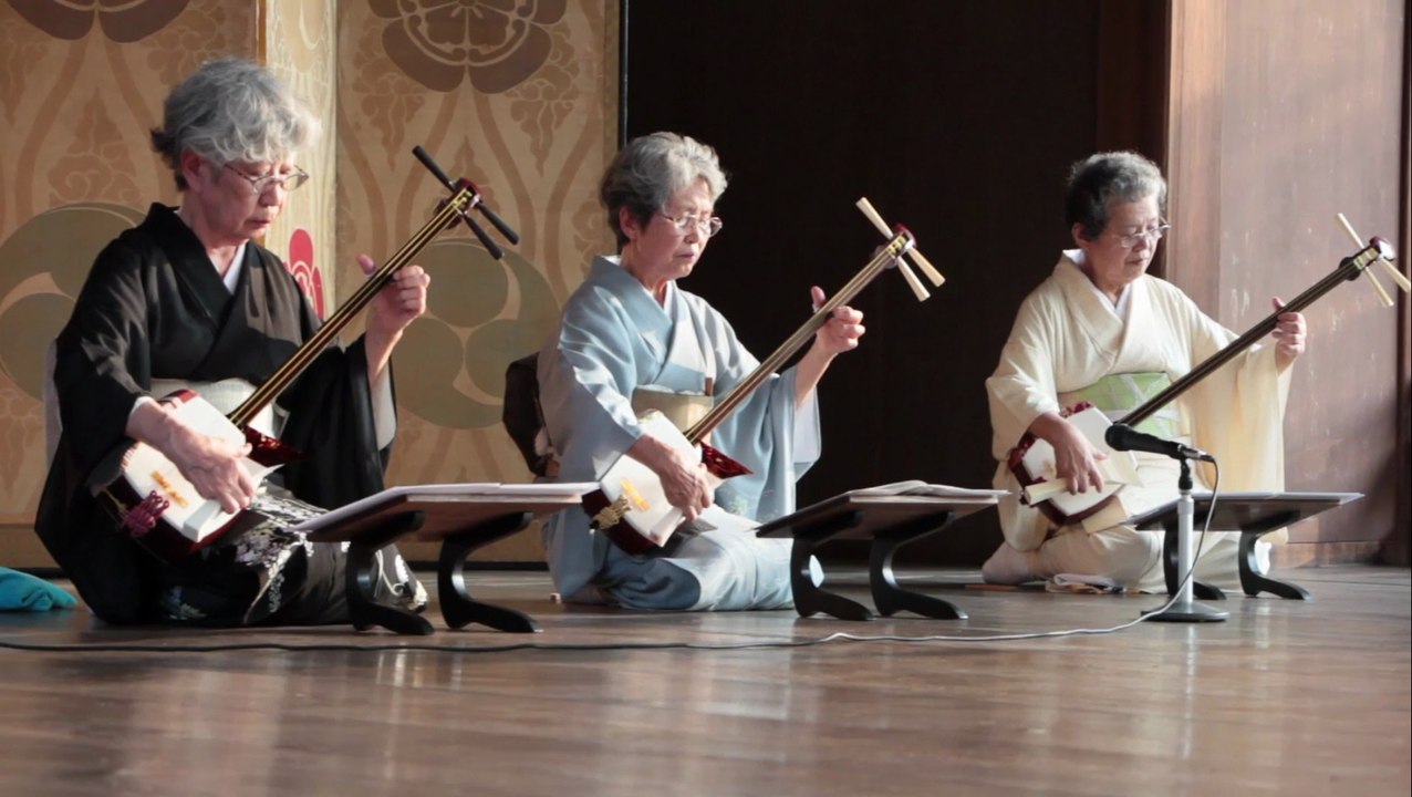 A Shamisen Performance on the Noh Stage of the Yasaka shrine in Kyoto.