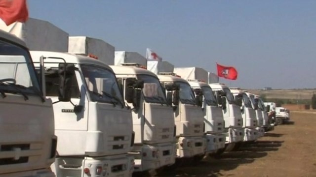 Ukrainian forces inspect Russian aid convoy