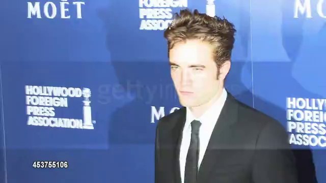 14.08.2014 Robert Pattinson at the HFPA Grants Banquet Red CarpePhotocall