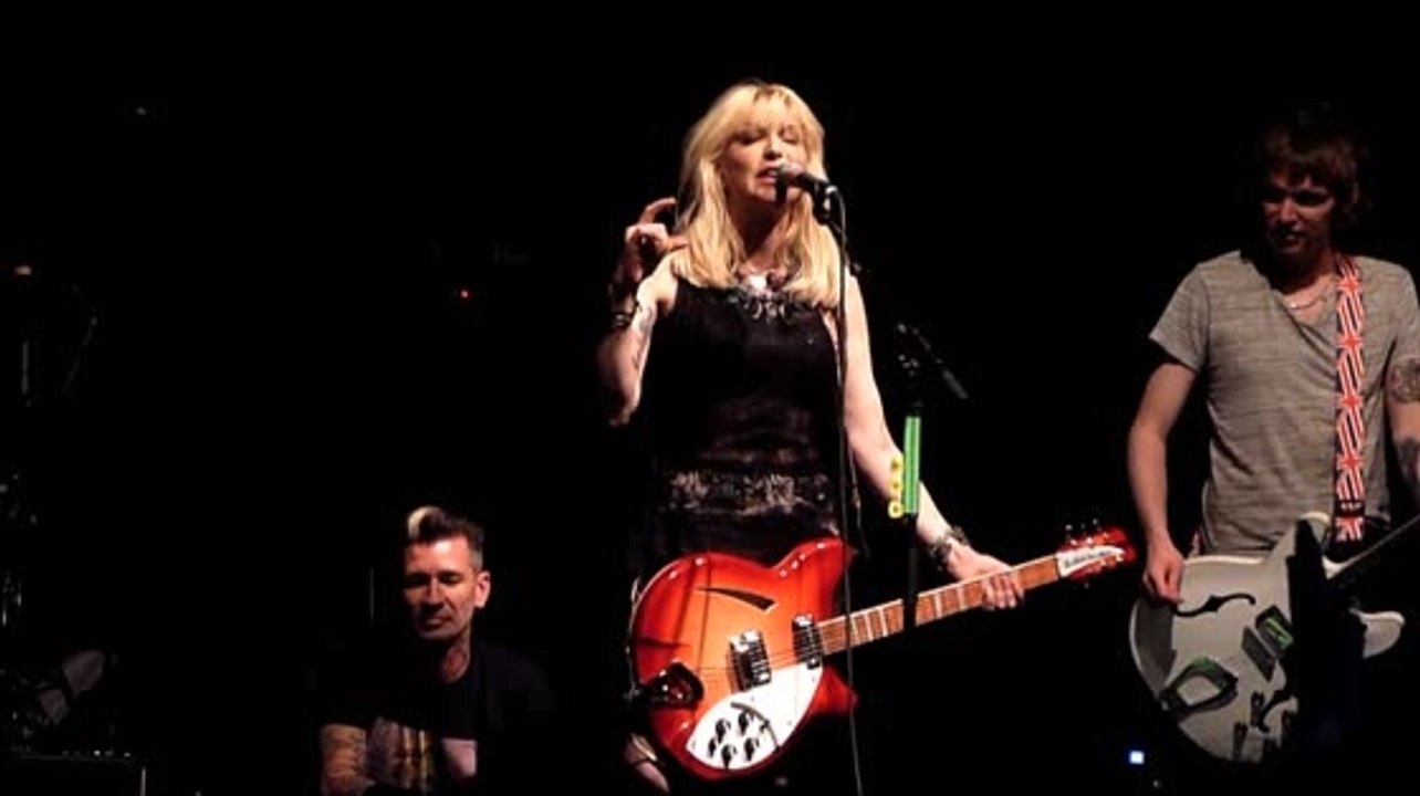 Courtney Love Cusses Out Beer Can Thrower At Concert
