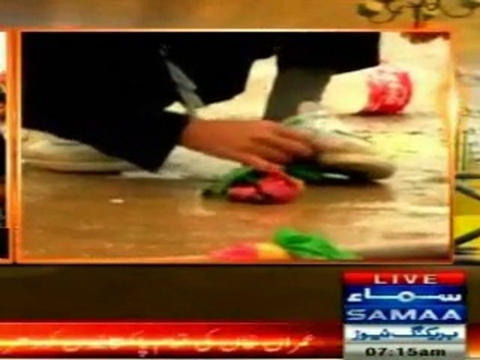 Cleaning Shoes with Pakistan Tehreek-e-Insaf flag in Adazi rally