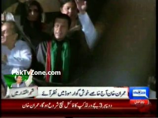 Imran Khan looking very happy at  PTI Rally