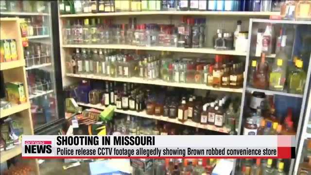 Police and protesters in Ferguson clash over curfew