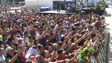 Bolt corre en playa de Rio