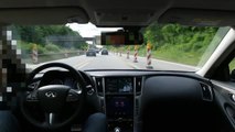 Infiniti Q50 with active lane control drives itself on highway