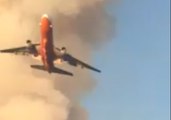 Jet Drops Retardant on California Wildfire