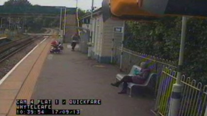 Terrifying moment pushchair rolls off train platform