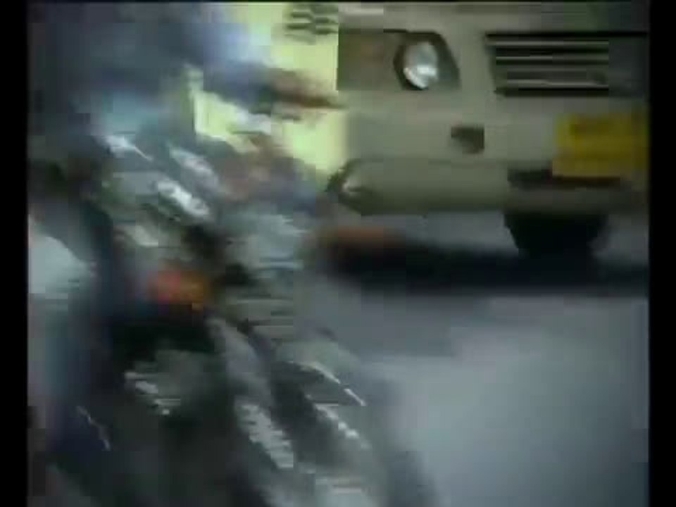 Mobile Phone women on Motorcycle India